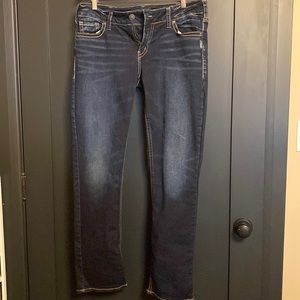 Silver mid-low rise jeans.